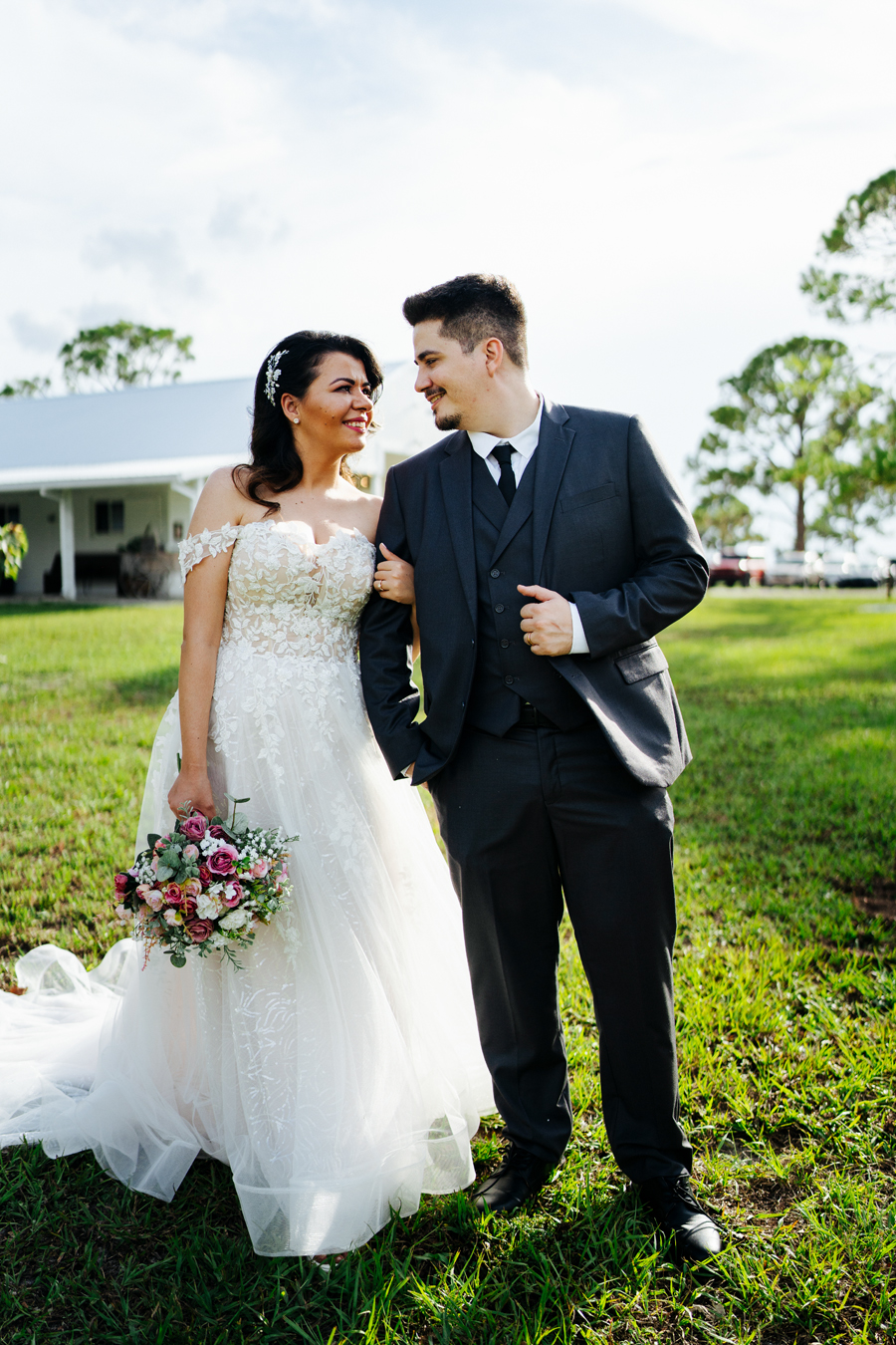 Bride and groom looking at each other with love